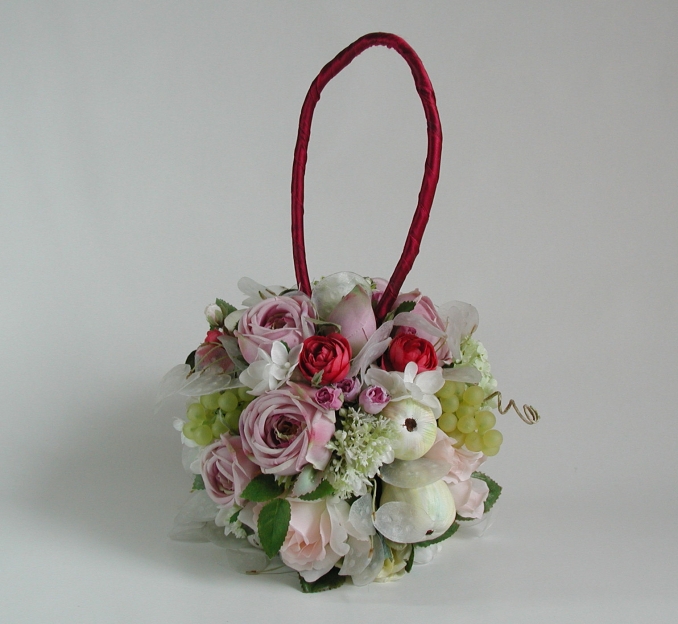 Rose Sensation An artificial ball-shaped bridal bouquet with variety of roses